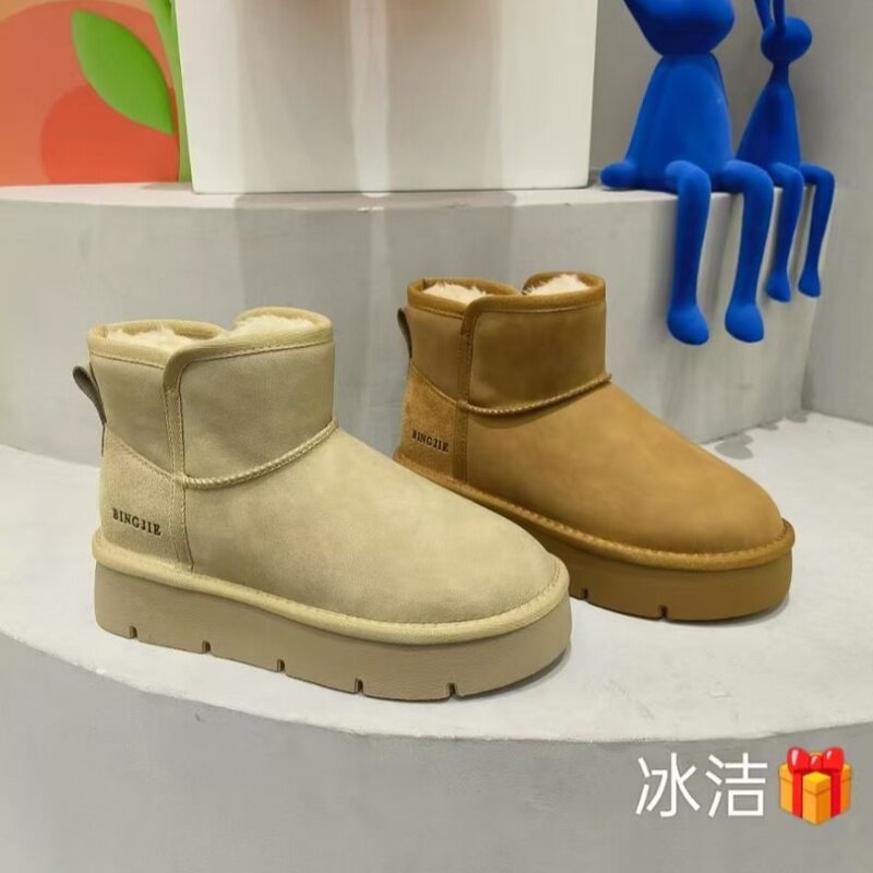 冰洁女鞋2024冬季新款短筒靴真皮平跟厚底圆头加绒保暖韩版雪地靴