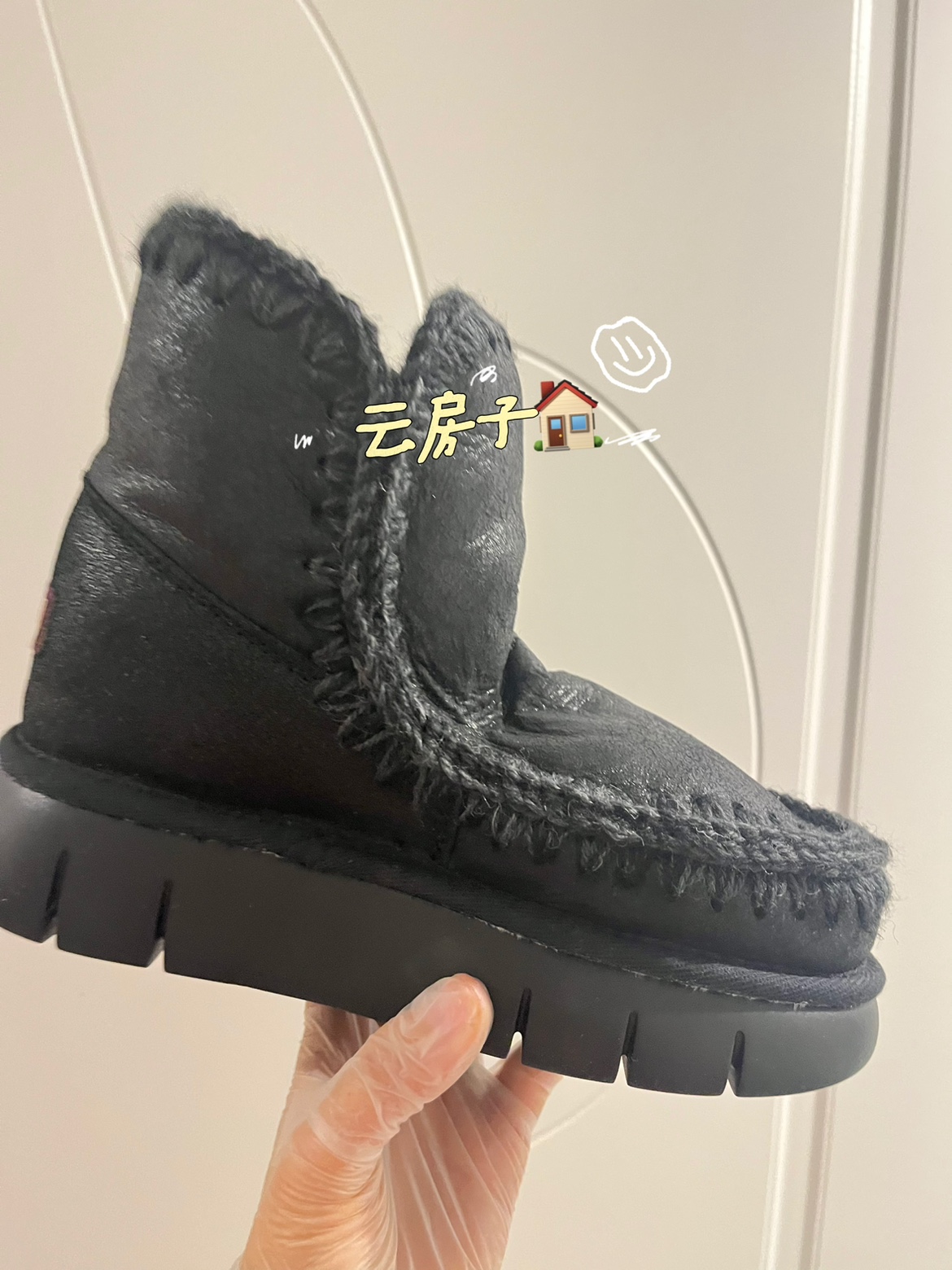 M女士羊皮毛一体雪地靴毛线编制爱斯基摩黑色龟裂厚底