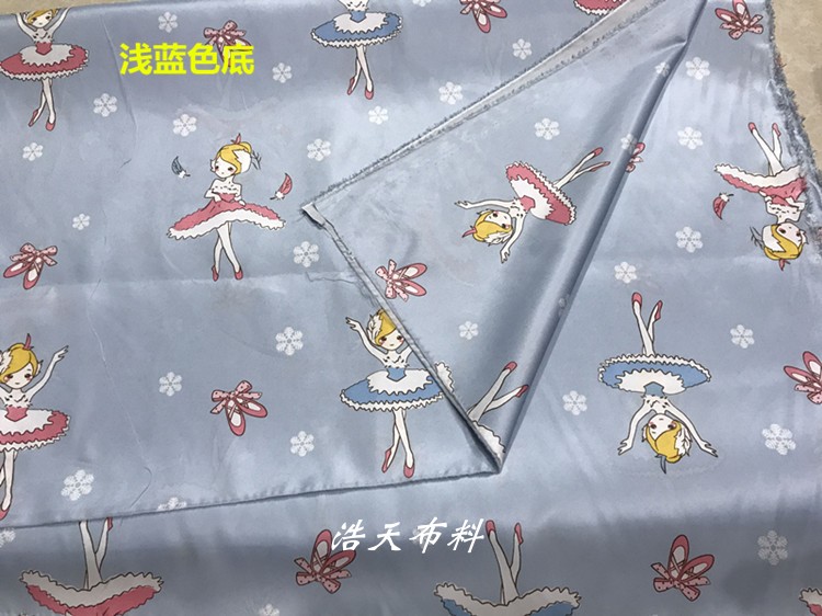 浅蓝色新款保暖防寒服面料儿童宝宝棉服宠物衣卡通印花羽绒服布料