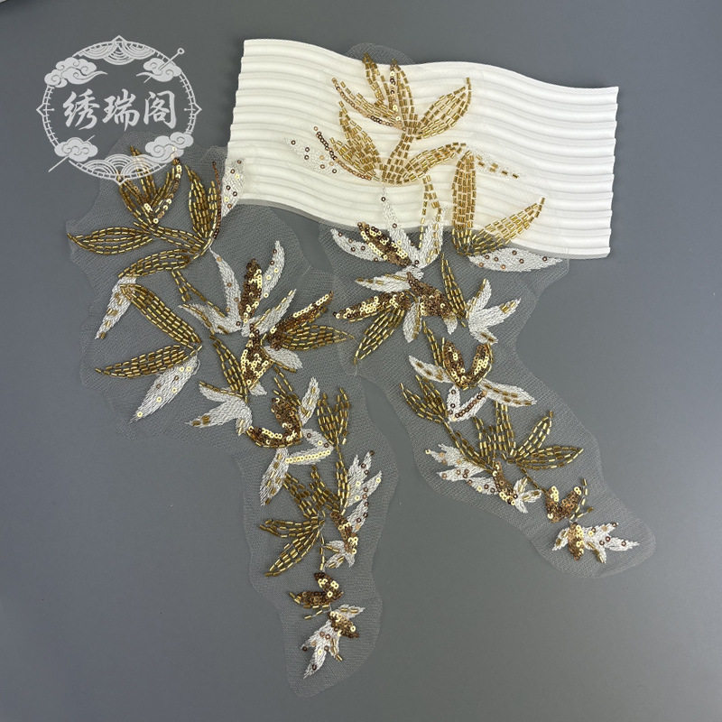 金色网底珠管绣布贴竹子亮片图片