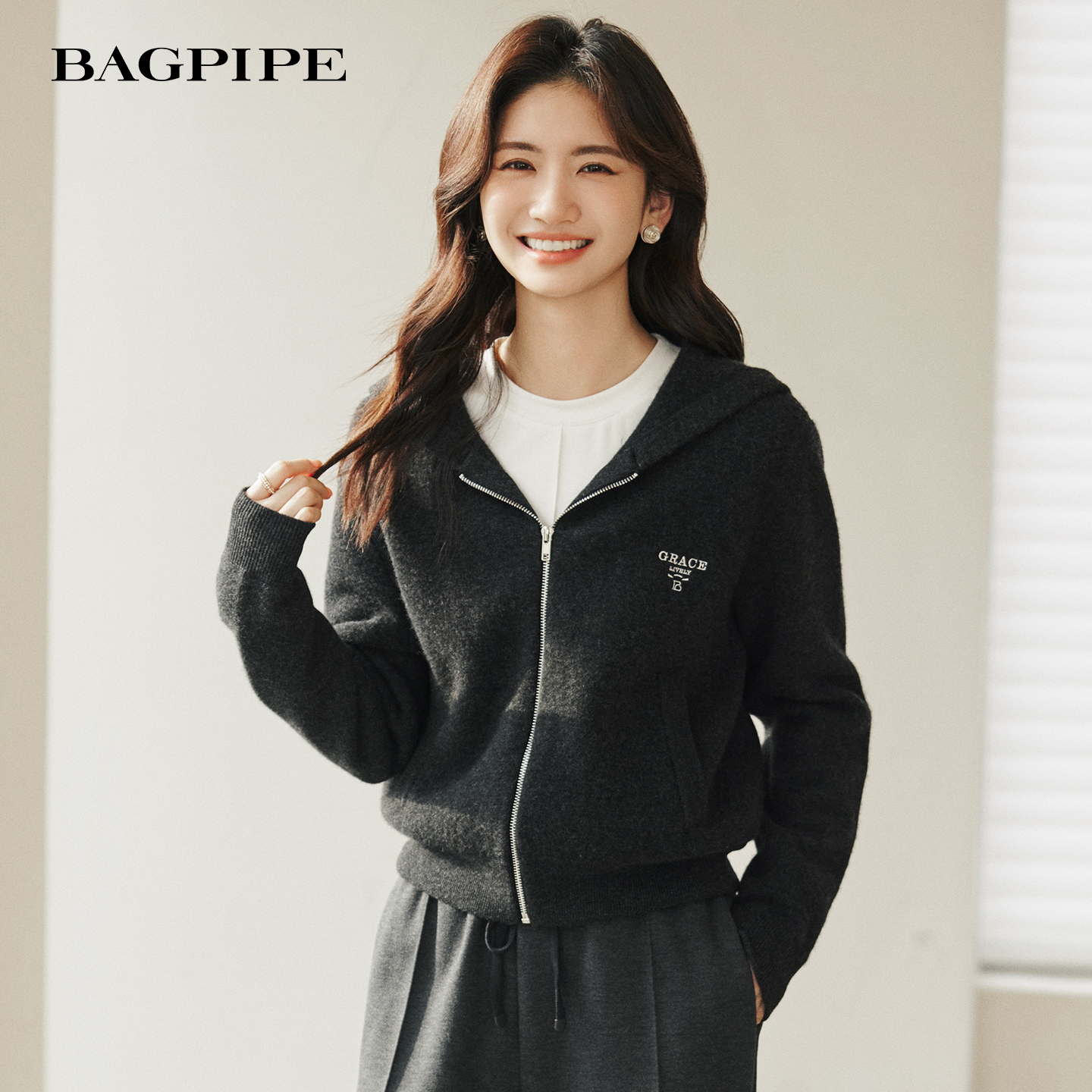 风笛2025冬季新款拉链开衫针织衫设计感休闲连帽宽松百搭上衣女