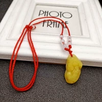 Желтая куколка с веревкой