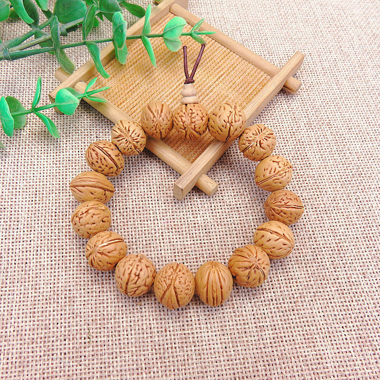 时尚男女天然桃核手串本命年