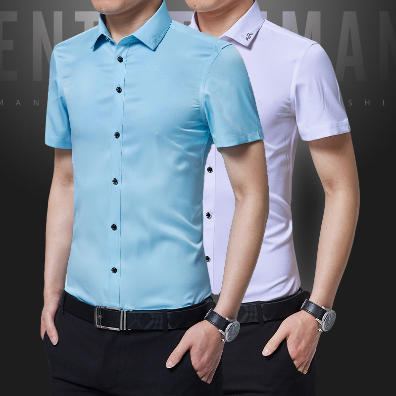 秋季男士韩版修身纯色短袖衬衫丝光棉商务青年休闲长袖衬衣潮大码