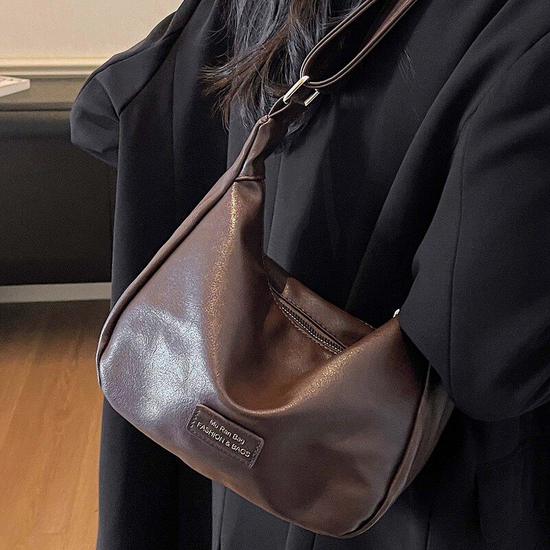 MK DA高级感复古腋下饺子包女2025新款百搭大容量通勤斜挎托特包