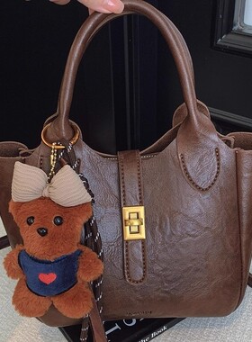 MK DA女包2025新款高级感通勤手提水桶包复古休闲百搭单肩斜挎包