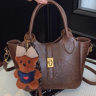 MK DA女包2025新款高级感通勤手提水桶包复古休闲百搭单肩斜挎包