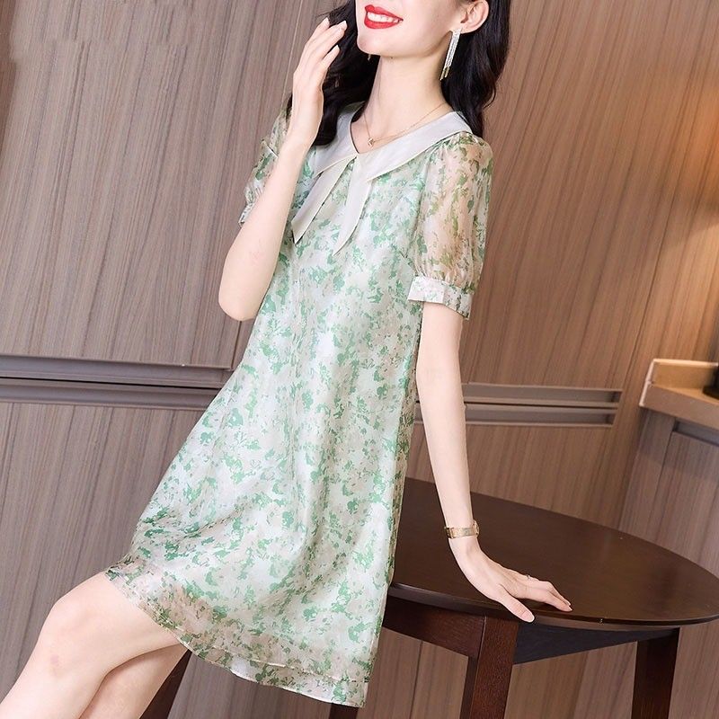 夏季女装2025年新款小清新减龄胖mm炸街大码娃娃领碎花网纱连衣裙