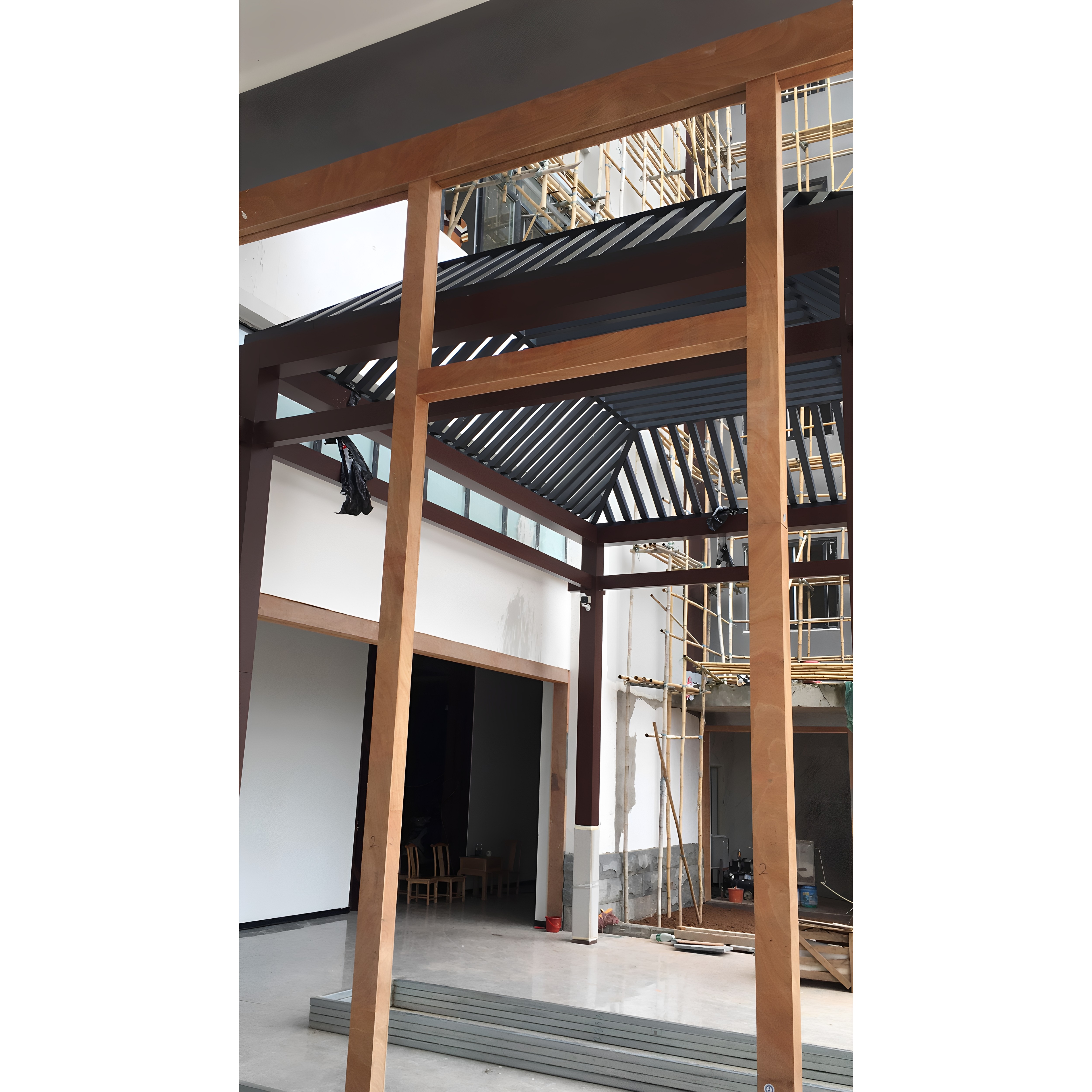 万佳欢酒店不锈钢木纹屏风宋式美学装修木纹包框装饰线条加工厂家