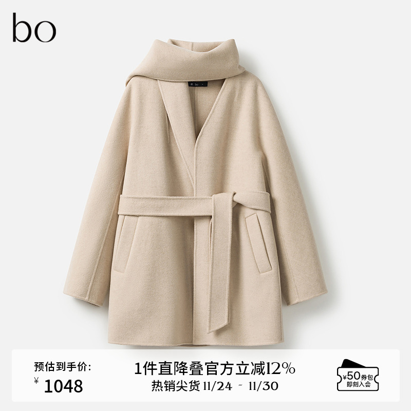 腰间系带收腰，两侧斜插口袋