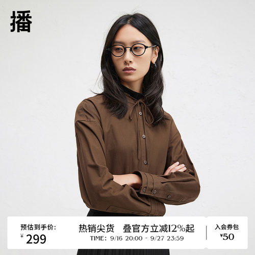 时髦串绳立领，袖口三层压褶设计