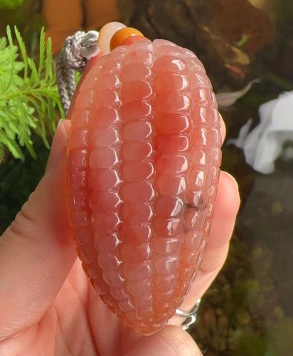 杨玉家天然黄龙玉玉米手玩件证书