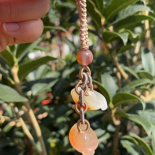 杨玉家天然黄龙玉包挂车挂