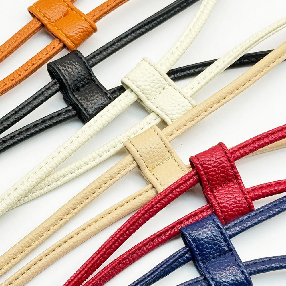 荔枝纹抽绳老花水桶包伸缩束形