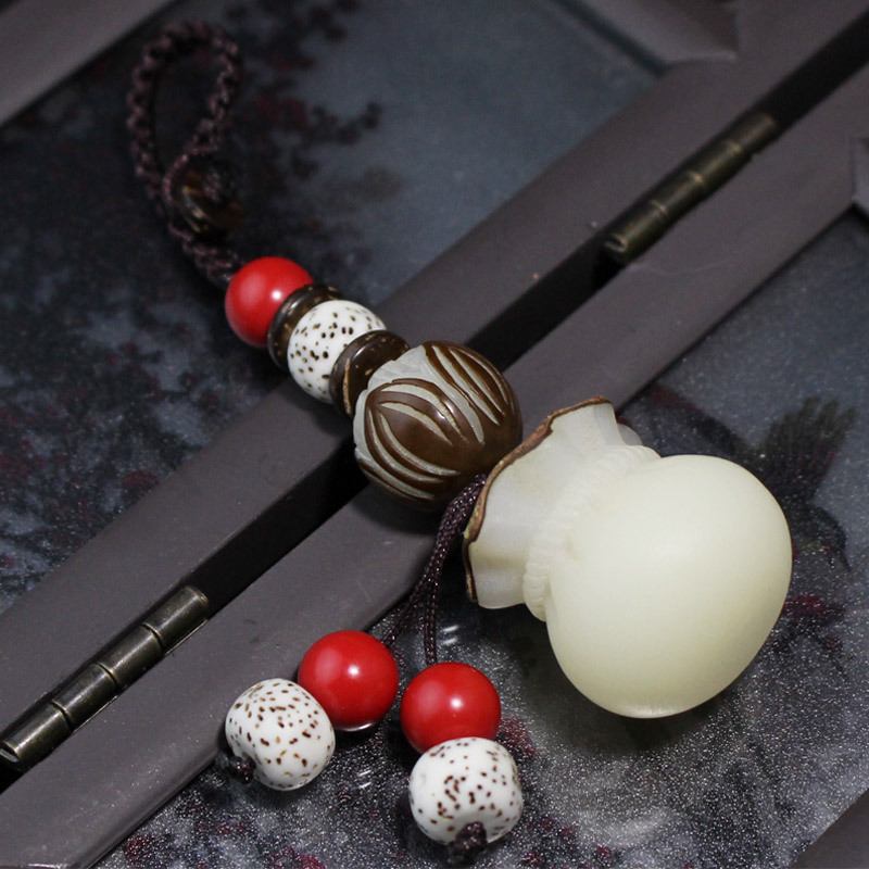 陵固思白仿菩提根雕袋汽车钥匙扣