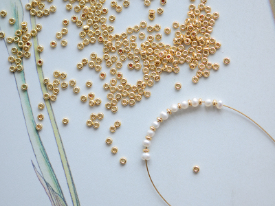 taobao agent ZZ83 Golden Glose, Japanese imported rice bead flat beads DIY beaded jewelry loose bead accessories 1 gram