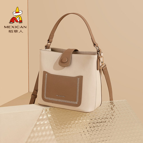 稻草人手提斜挎包牛皮百搭