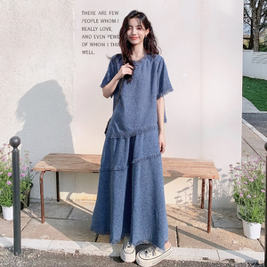 清冷松弛感穿搭套装裙女夏新款小香风不规则流苏上衣半身裙两件套图片