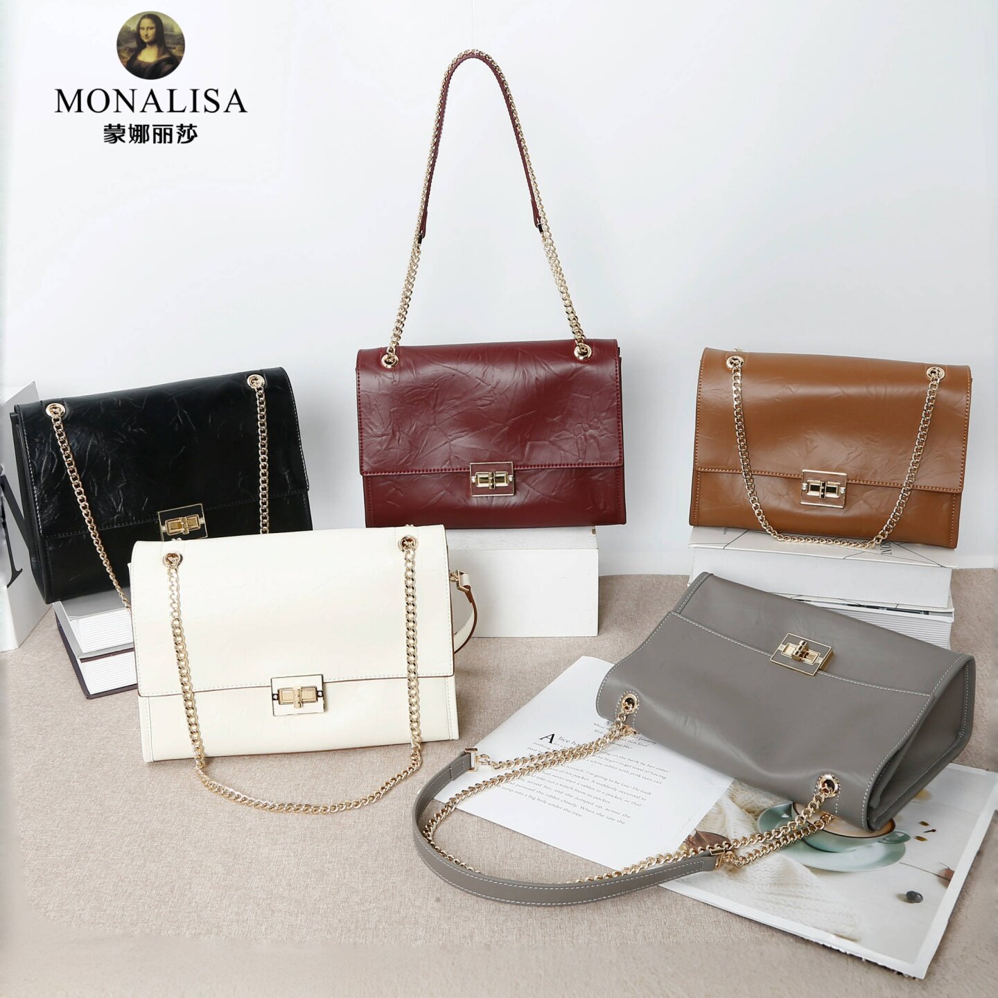 蒙娜丽莎女包2025秋新款牛皮简约时尚纯色链条斜挎单肩腋下小方包