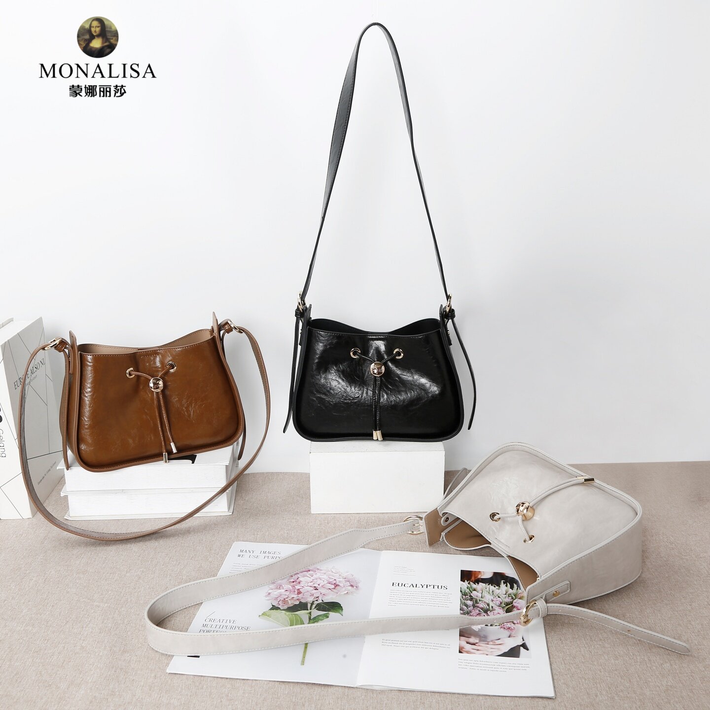 蒙娜丽莎女包2025秋季新款大牌时尚百搭简约单肩斜挎手提包水桶包
