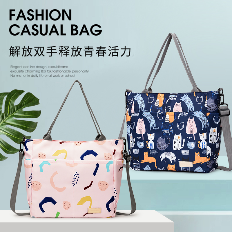 新款时尚防水印花手提女包单肩斜跨包外出大容量轻便手提包妈咪包