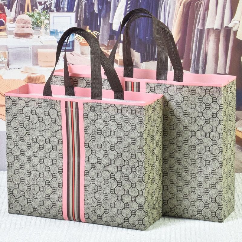 粉边老花字母潮款服装礼品手提袋衣服购物袋无纺布覆膜包装女装子