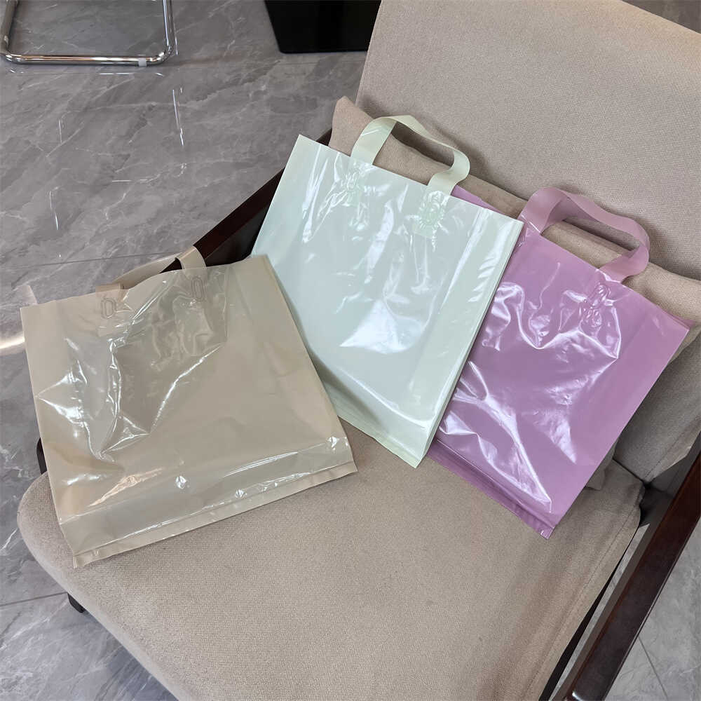 服装店用衣物鞋盒女装店服饰手提袋子包装购物打包袋印刷定制logo