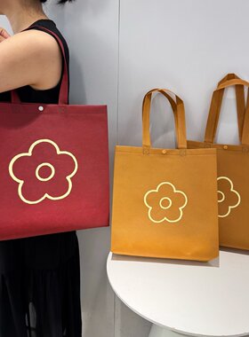 时尚花朵无纺布服装店手提袋