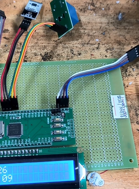 adc0832土壤温度控制水泵浇水蜂鸣器报警