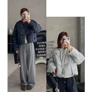 高端气质珠光缎面冬季新国标90白鸭绒圆领时尚设计感保暖羽绒服女