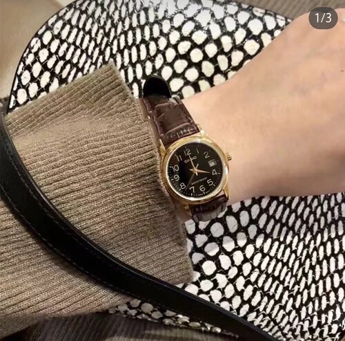 卡西欧手表女小圆时尚皮带黑金