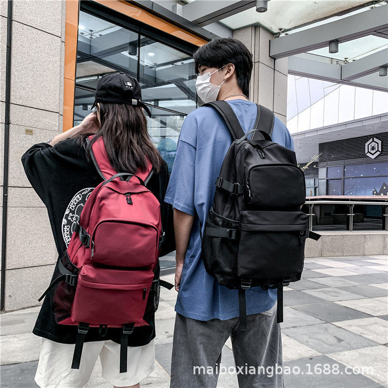 情侣背包街头潮酷双肩包女韩版简约校园电脑书包大学生休闲旅行包