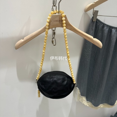 串珠肩带真皮女包橄榄球挎包