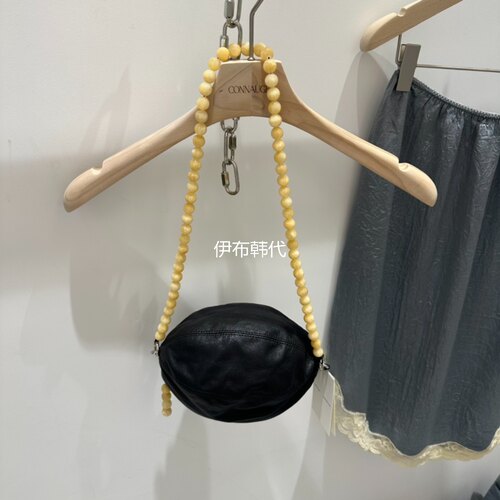 串珠肩带真皮女包橄榄球挎包
