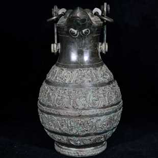 春秋战国青铜夔龙铭文鹰首酒樽提梁卣