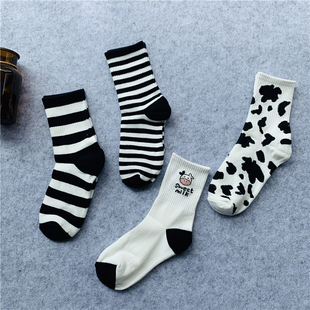 25秋冬新品 韩国奶牛条纹潮袜子ins黑白学院风男女情侣纯棉中长筒