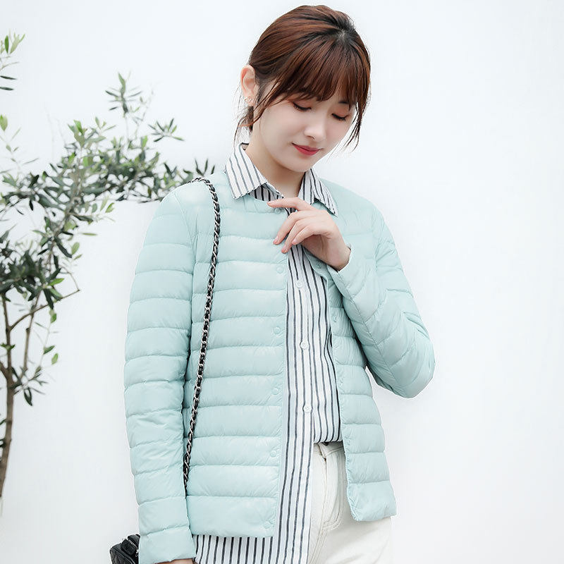 唯品会特卖断码清仓特价处理轻薄白鸭绒羽绒服女装品牌正品春秋冬