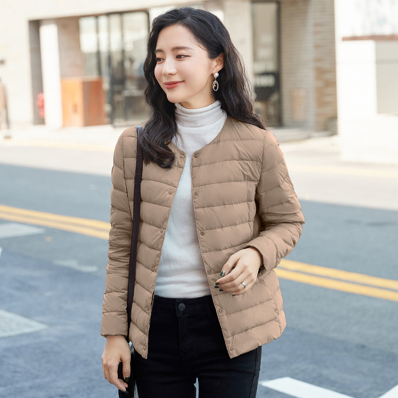 唯品会特卖断码清仓特价处理轻薄白鸭绒羽绒服女装品牌正品春秋冬