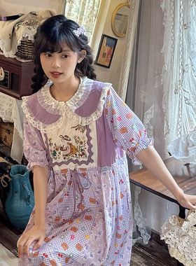 森系少女田园风碎花拼接紫色连衣裙复古感胸前花朵刺绣娃娃裙长裙