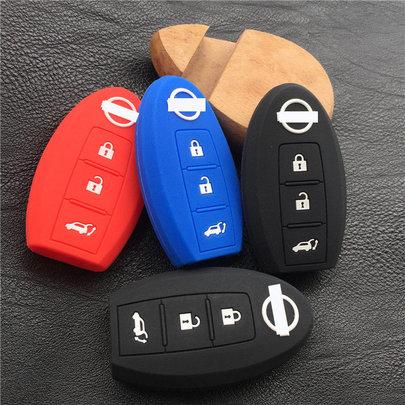 适用日产奇骏天籁轩逸新阳光骐达骊威逍客三键智能钥匙硅胶套 包