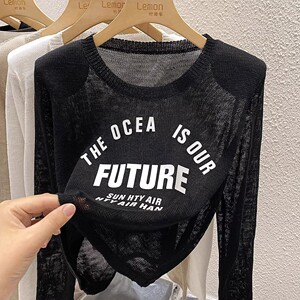 2023黑色字母长袖针织T恤女秋季设计感小众镂空宽松防晒罩衫上衣