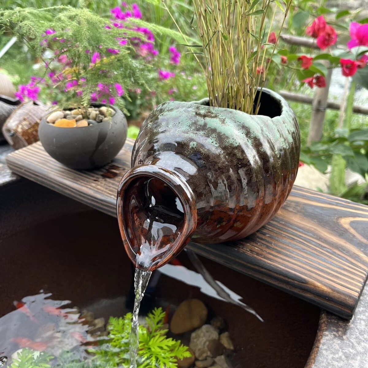 鱼缸造景流水摆件自动流水陶罐