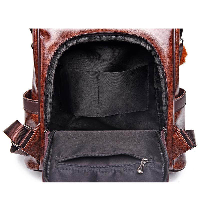 KOREAN VERSION OF THE NEW FASHION LEATHER CAPACITY KOREAN VERSION OF THE STREET CASUAL BAG BACKPACK BIG SOFT WOMENS BAG BACKPACK