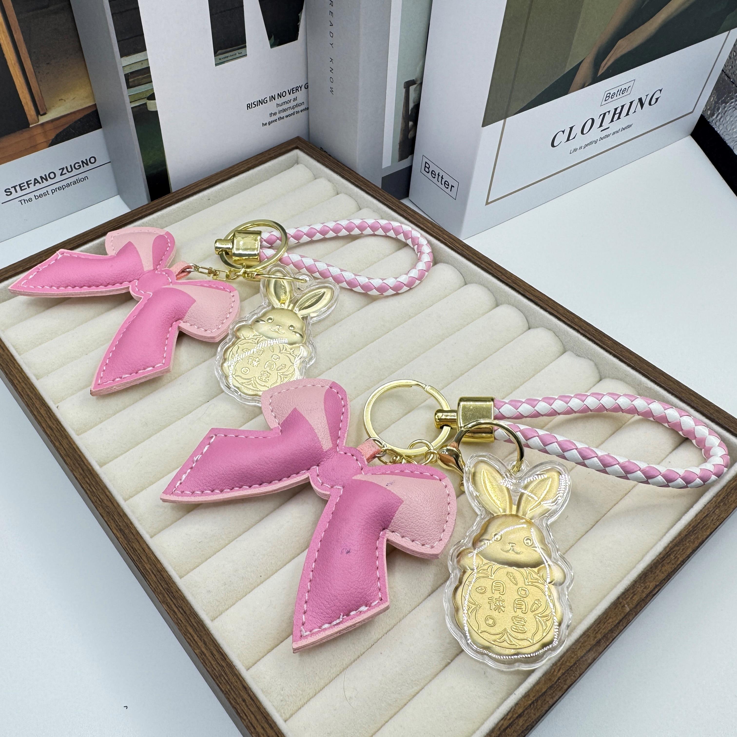 新款足金粉色蝴蝶结月徕