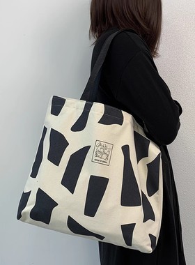 单肩大容量帆布包女原创手提袋大学生上课andy包包工厂店托特包男