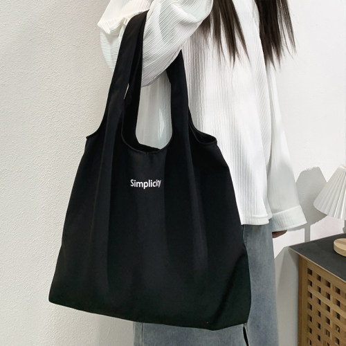 单肩字母大容量简约百搭帆布包