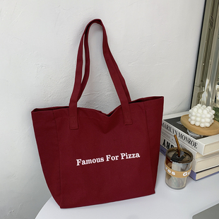 韩系字母简约慵懒文艺单肩帆布包袋百搭大容量学生通勤托特红色包
