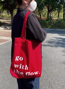韩版ins日系红色帆布单肩包女简约字母流行精致手提布袋学生书包