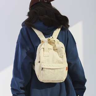 2026新款迷你双肩包女学生文艺复古帆布包纯色百搭逛街出游小背包