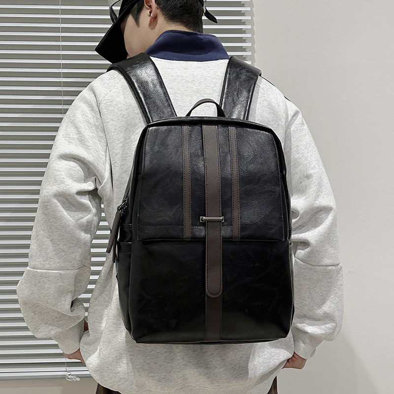 英伦极简学院风双肩包女生复古旅行背包男大容量简约皮pu学生书包